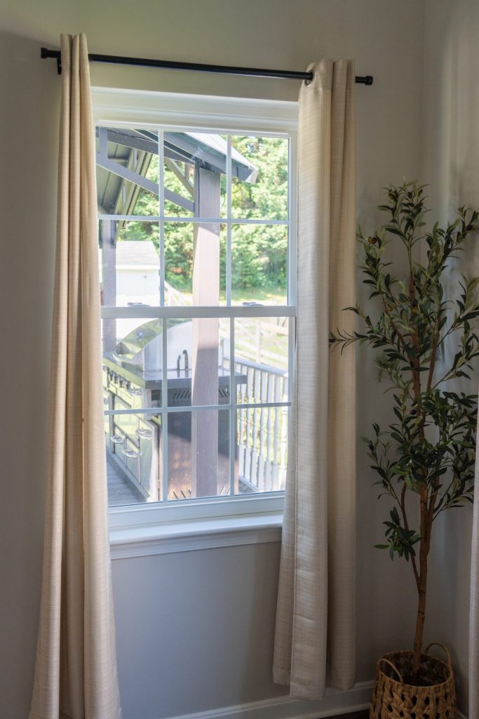 Tall Vytex Fortis white window with curtains