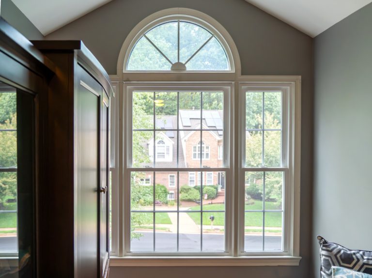 Vytex Georgetown double-hung windows with an arched transom