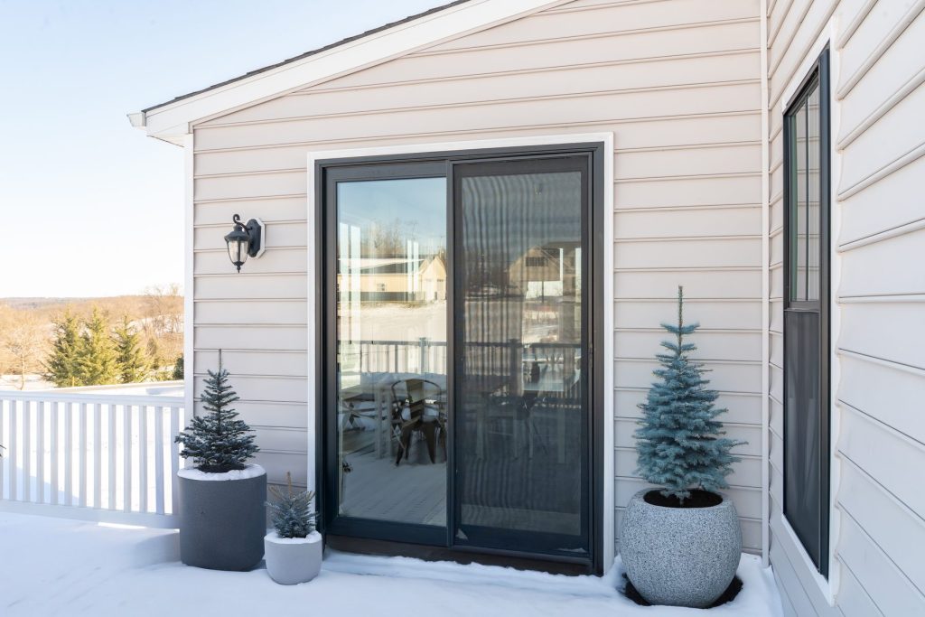 Vytex Signature Series patio door in True Black on a home exterior