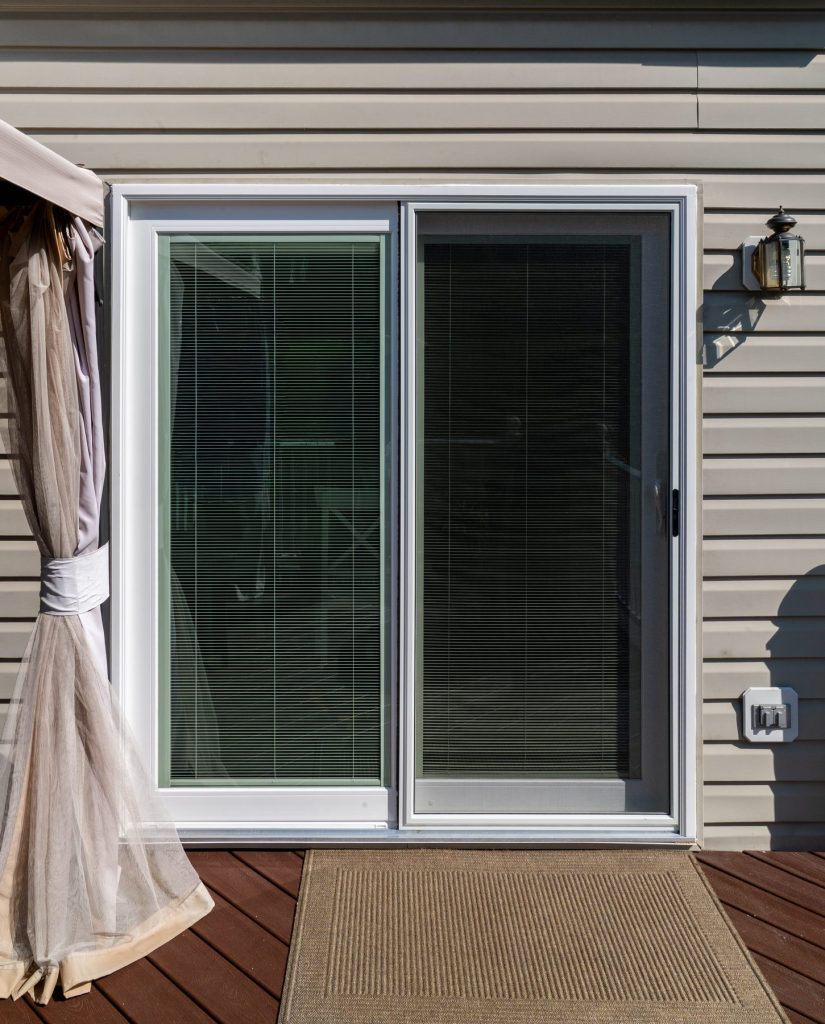 Vytex Signature Series patio door with built-in blinds between the glass