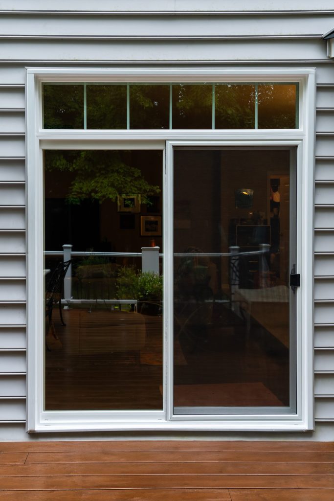 Vytex 7000 Series sliding patio door with transom window above