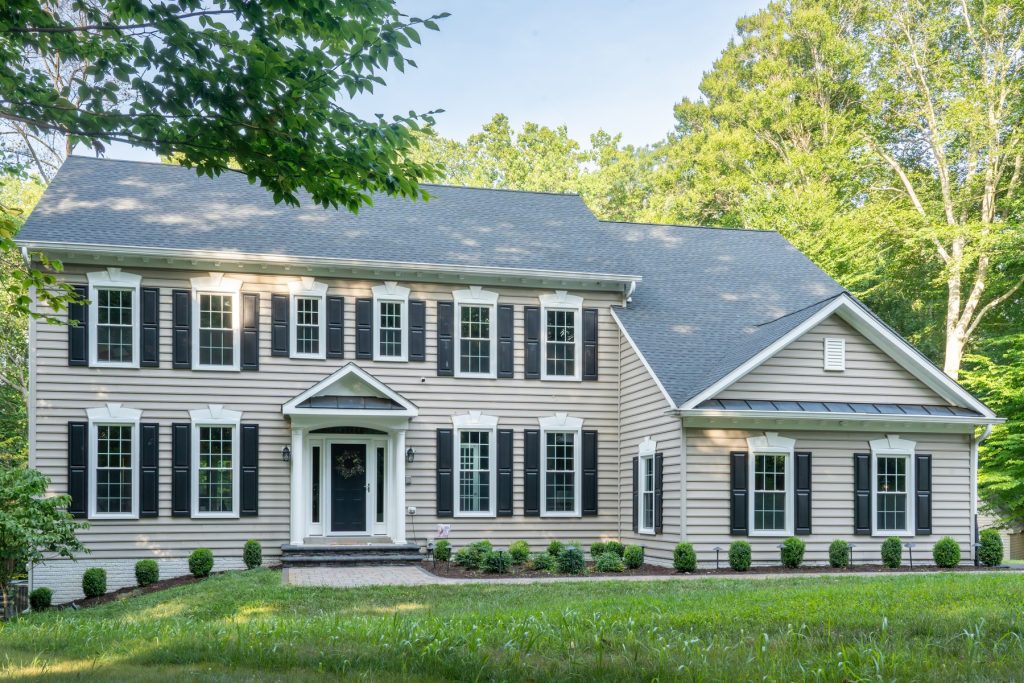 Vytex Georgetown Elite windows on a brick colonial home